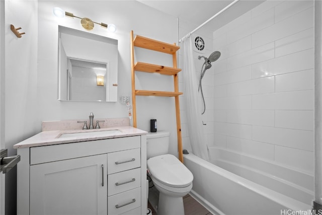 full bathroom featuring vanity, toilet, and shower / bath combo with shower curtain