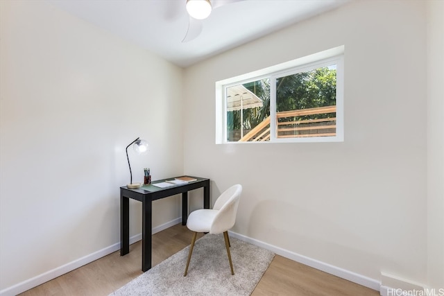 office area featuring light hardwood / wood-style floors and ceiling fan