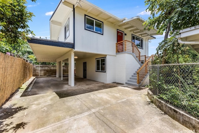 exterior space with a carport