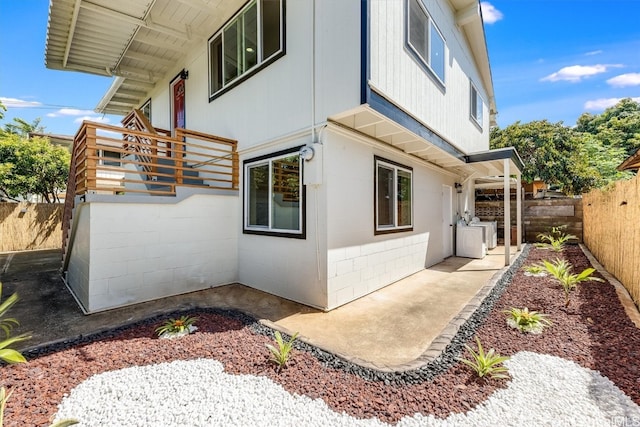 view of home's exterior with a patio