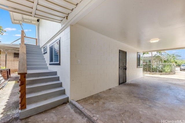 doorway to property featuring a patio area