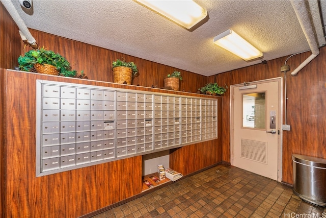 view of home's community featuring mail boxes