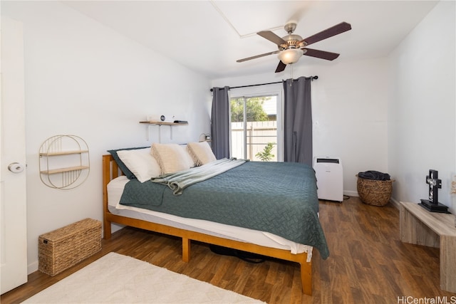 bedroom featuring dark wood-type flooring and ceiling fan