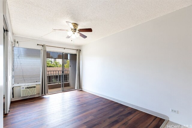 unfurnished room with ceiling fan, a textured ceiling, wood finished floors, and a wall unit AC