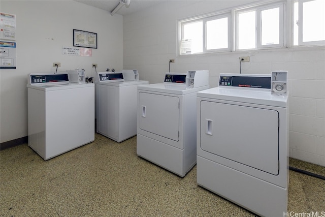 laundry room with independent washer and dryer