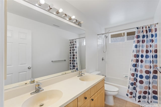 full bathroom featuring tile patterned floors, vanity, toilet, and shower / tub combo with curtain