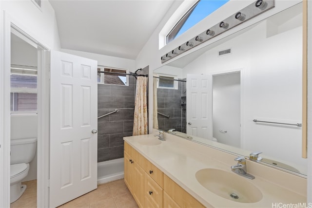 bathroom with tile patterned flooring, toilet, lofted ceiling, and a shower with shower curtain