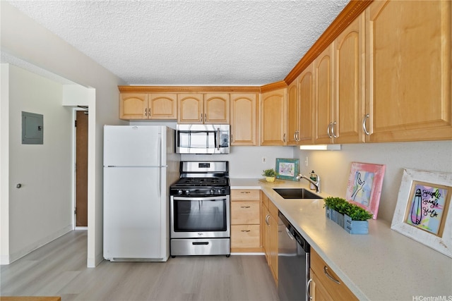 475 Atkinson Dr Unit 1702, Honolulu, HI 96814 - kitchen with stainless steel appliances, light wood finished floors, electric panel, light countertops, and a textured ceiling