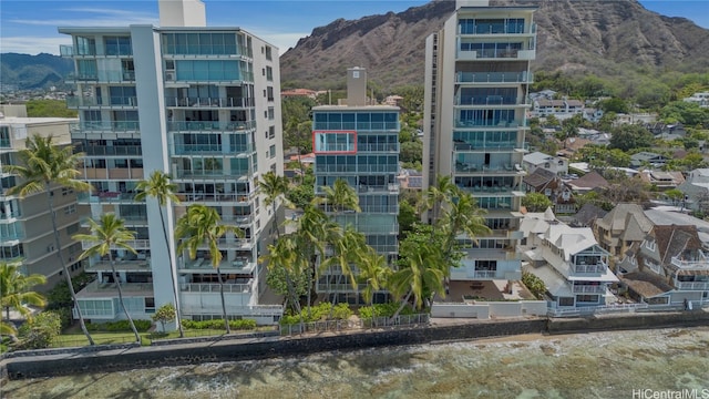 view of building exterior featuring a mountain view