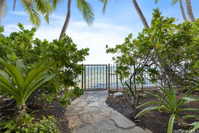 view of gate featuring a water view