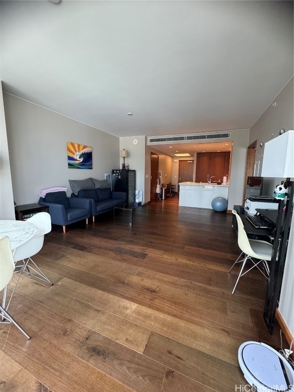 living room featuring dark hardwood / wood-style floors