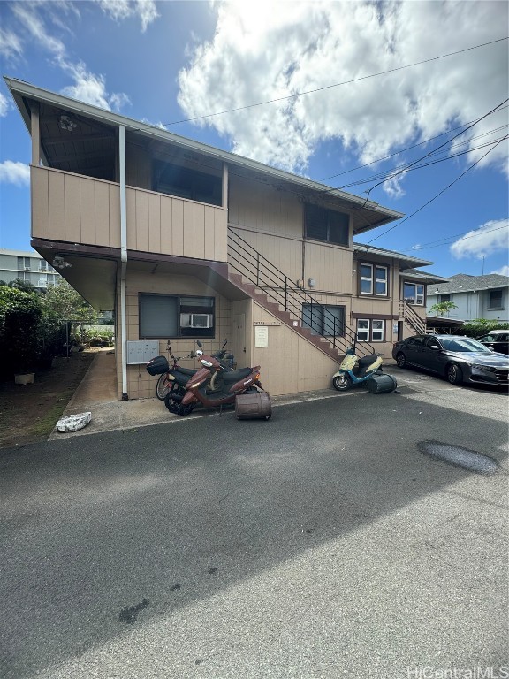 view of property featuring a carport