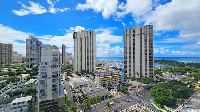 property's view of city featuring a water view