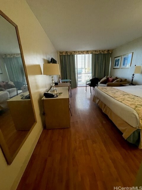 bedroom featuring wood-type flooring