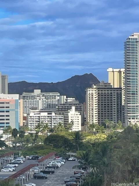 city view with a water and mountain view