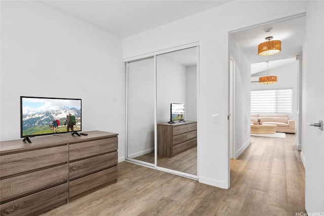 91-1030 Hoopili St Unit 54, Ewa Beach, HI 96706 - bedroom with light wood finished floors and a closet