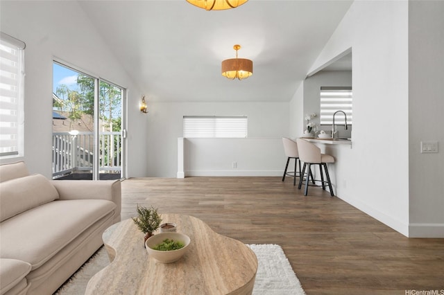 91-1030 Hoopili St Unit 54, Ewa Beach, HI 96706 - living area with wood finished floors and lofted ceiling