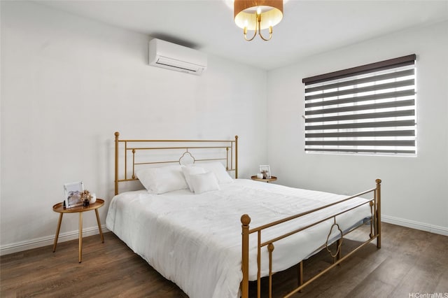 91-1030 Hoopili St Unit 54, Ewa Beach, HI 96706 - bedroom featuring a wall mounted AC and wood finished floors