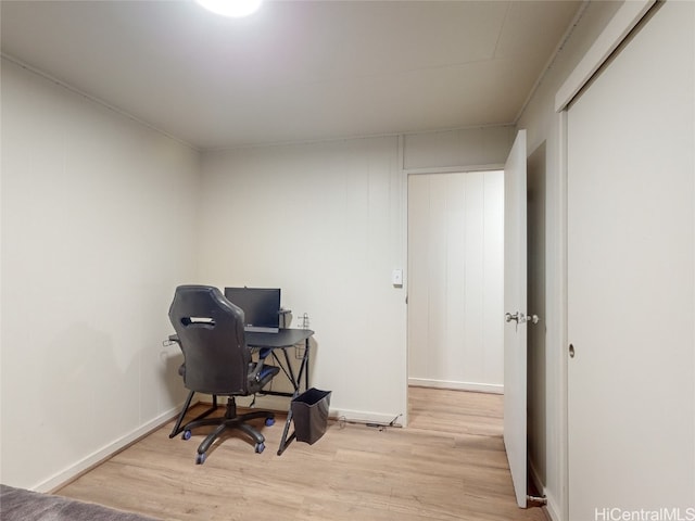 office space with light wood-type flooring