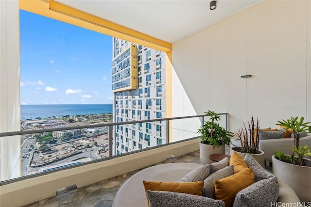 balcony featuring a water view