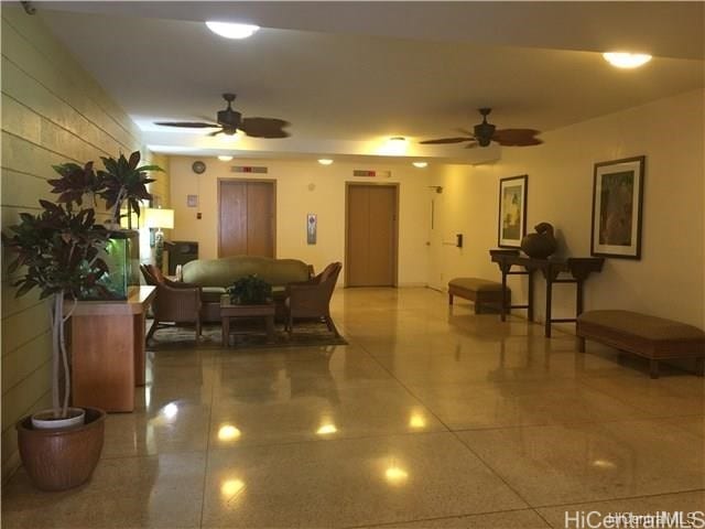 dining area featuring ceiling fan and elevator