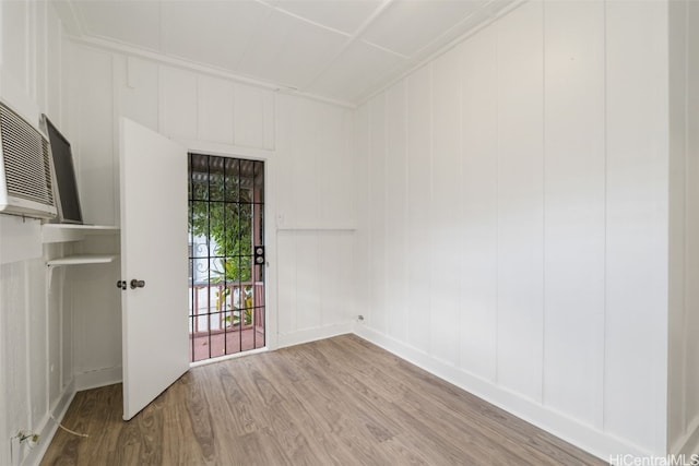 spare room featuring hardwood / wood-style floors