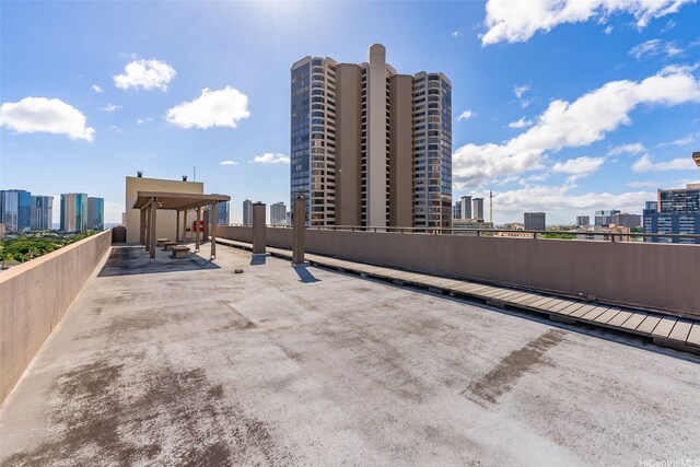 1040 Kinau St Unit 704, Honolulu, HI 96814 - view of patio with a skyline view
