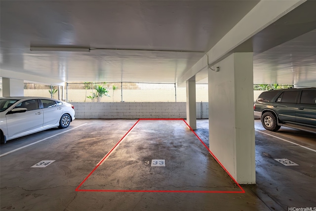 1040 Kinau St Unit 704, Honolulu, HI 96814 - parking garage featuring fence