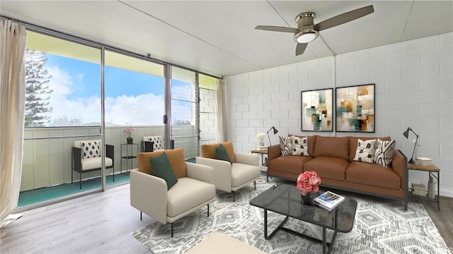 sunroom with plenty of natural light and ceiling fan