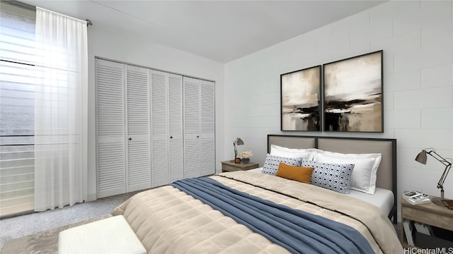 carpeted bedroom featuring a closet