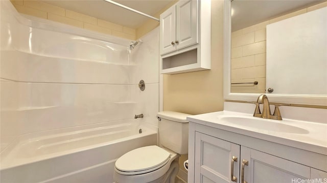 full bathroom featuring toilet, vanity, and tiled shower / bath