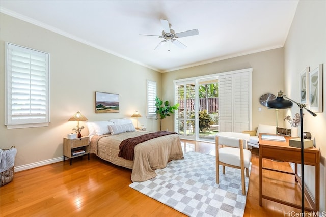 bedroom featuring ornamental molding, hardwood / wood-style floors, access to exterior, and ceiling fan