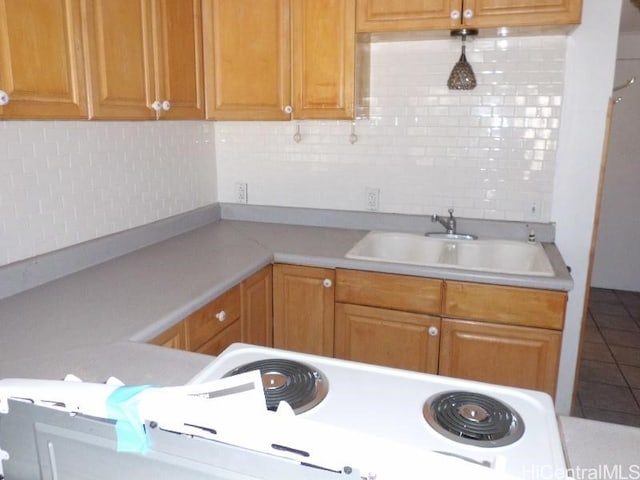 85-175 Farrington Hwy Unit C315, Waianae, HI 96792 - kitchen with a sink, light countertops, decorative backsplash, and tile patterned flooring