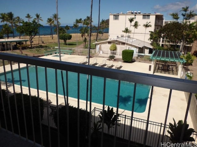 view of swimming pool featuring a patio