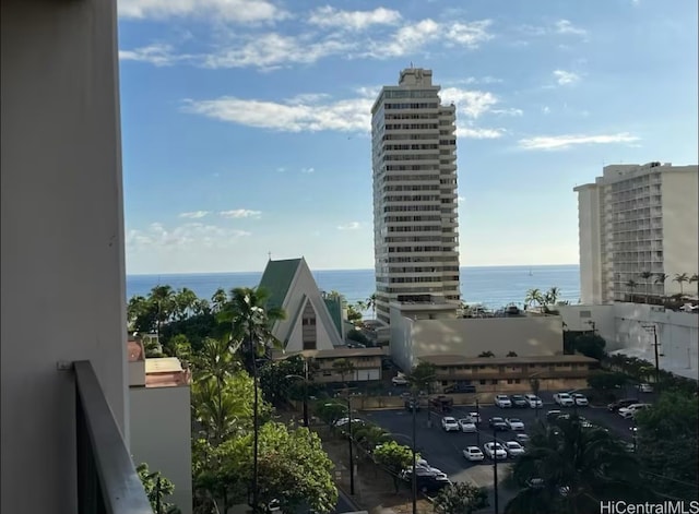 property's view of city with a water view