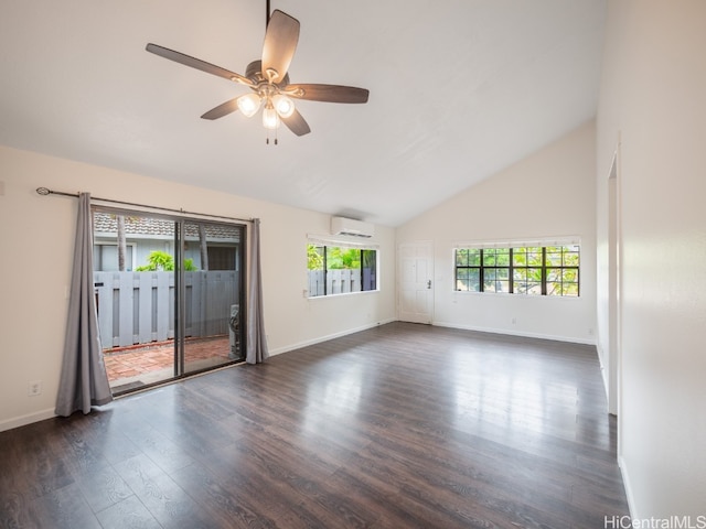 spare room featuring a wall mounted air conditioner, a healthy amount of sunlight, ceiling fan, and dark hardwood / wood-style flooring