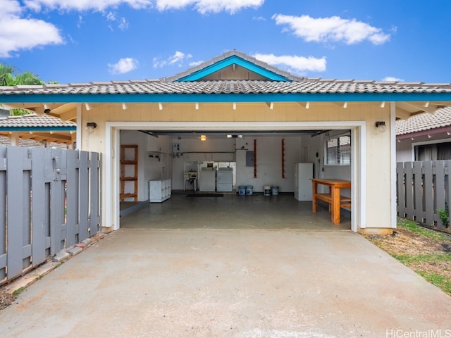 view of side of property with washing machine and dryer