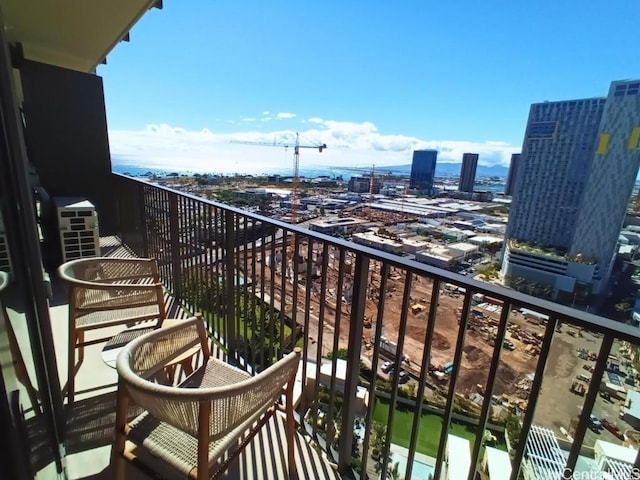 balcony featuring a city view