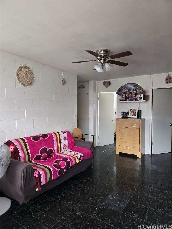 living room featuring ceiling fan