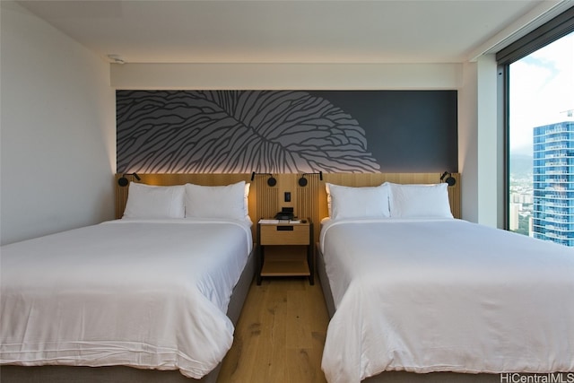 bedroom with light wood-type flooring