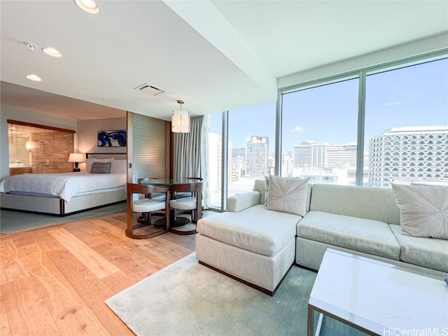 bedroom with hardwood / wood-style flooring