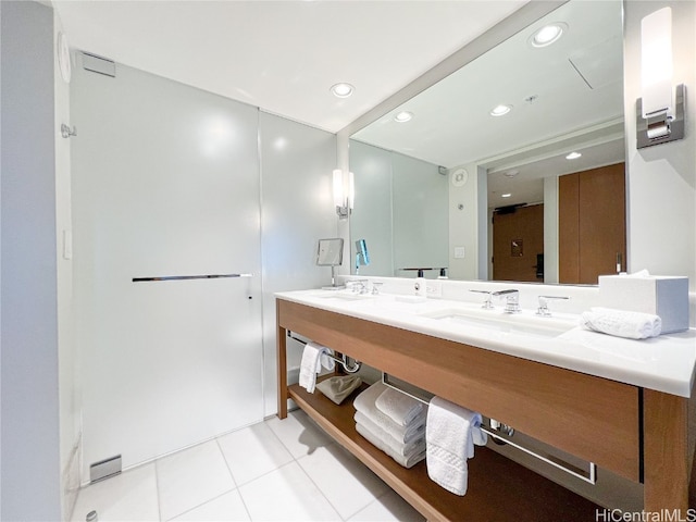 bathroom with vanity and tile patterned flooring