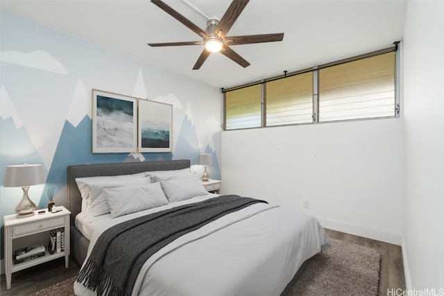 bedroom with hardwood / wood-style flooring and ceiling fan