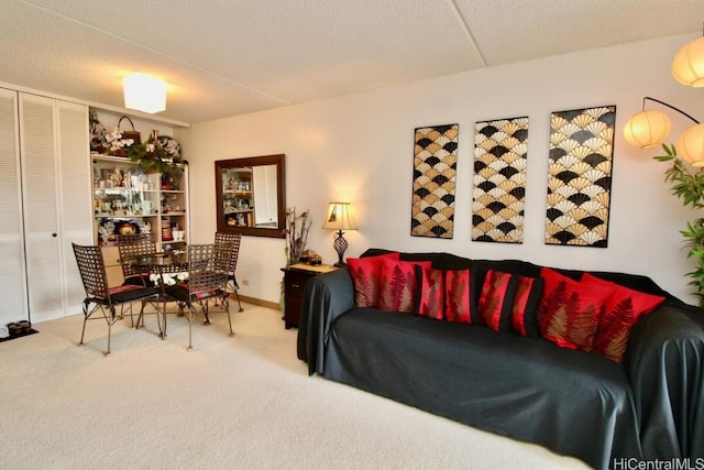 carpeted bedroom with a textured ceiling