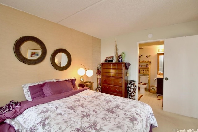 bedroom featuring connected bathroom