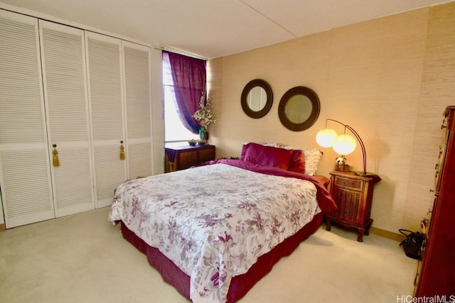 bedroom with a closet and carpet flooring