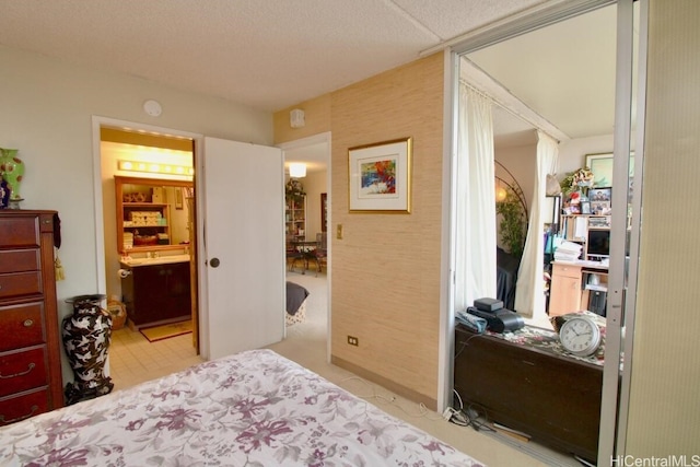 bedroom with connected bathroom