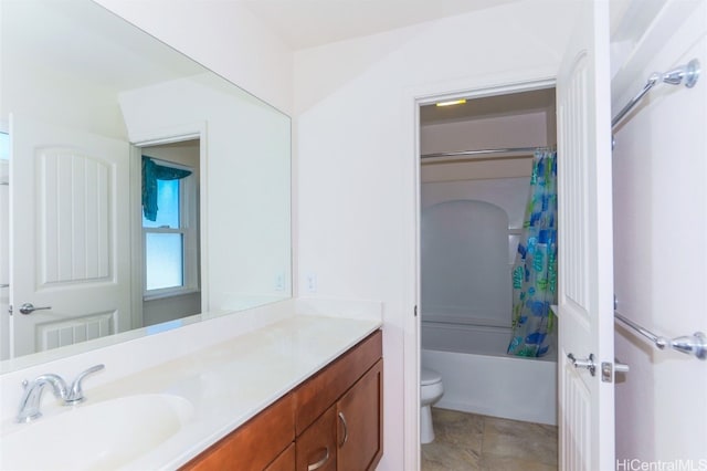 full bathroom featuring toilet, shower / tub combo with curtain, and vanity