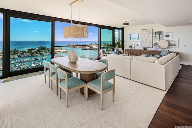 1100 Ala Moana Blvd Unit 1400/1402, Honolulu, HI 96814 - dining area featuring wood finished floors, a water view, a wall of windows, and view of marina