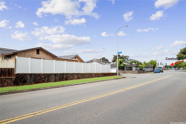 94-1420 Kahuli St, Waipahu, HI 96797 - view of asphalt street with street lighting, curbs, and sidewalks